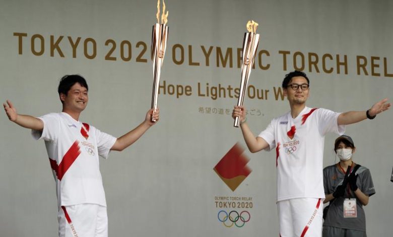 الشعلة الأولمبية تصل إلى طوكيو في حفل خال من الجمهور