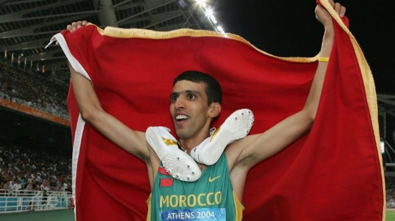 هشام الكروج يساند المنتخب الوطني أمام بلجيكا في كأس العالم